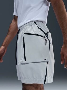Nike White Athletic Shorts with Black Zipper Accents